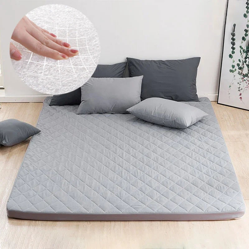 matelas-camging-oreillers-parquet