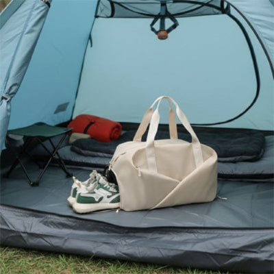 sac-de-voyage-femme-blanc-tente-bleue