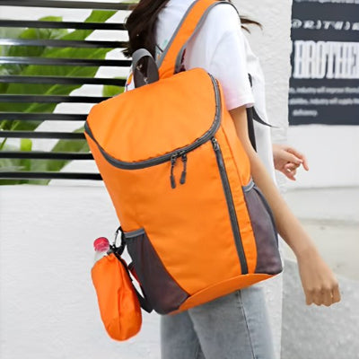 sac-dos-pour-randonnee-orange-fille