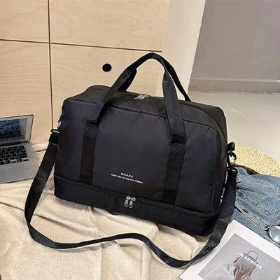 sac-voyage-noir-jeans-portable
