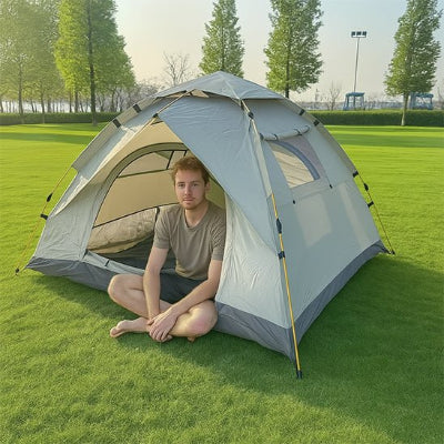 tente-de camping-homme-assis-entree